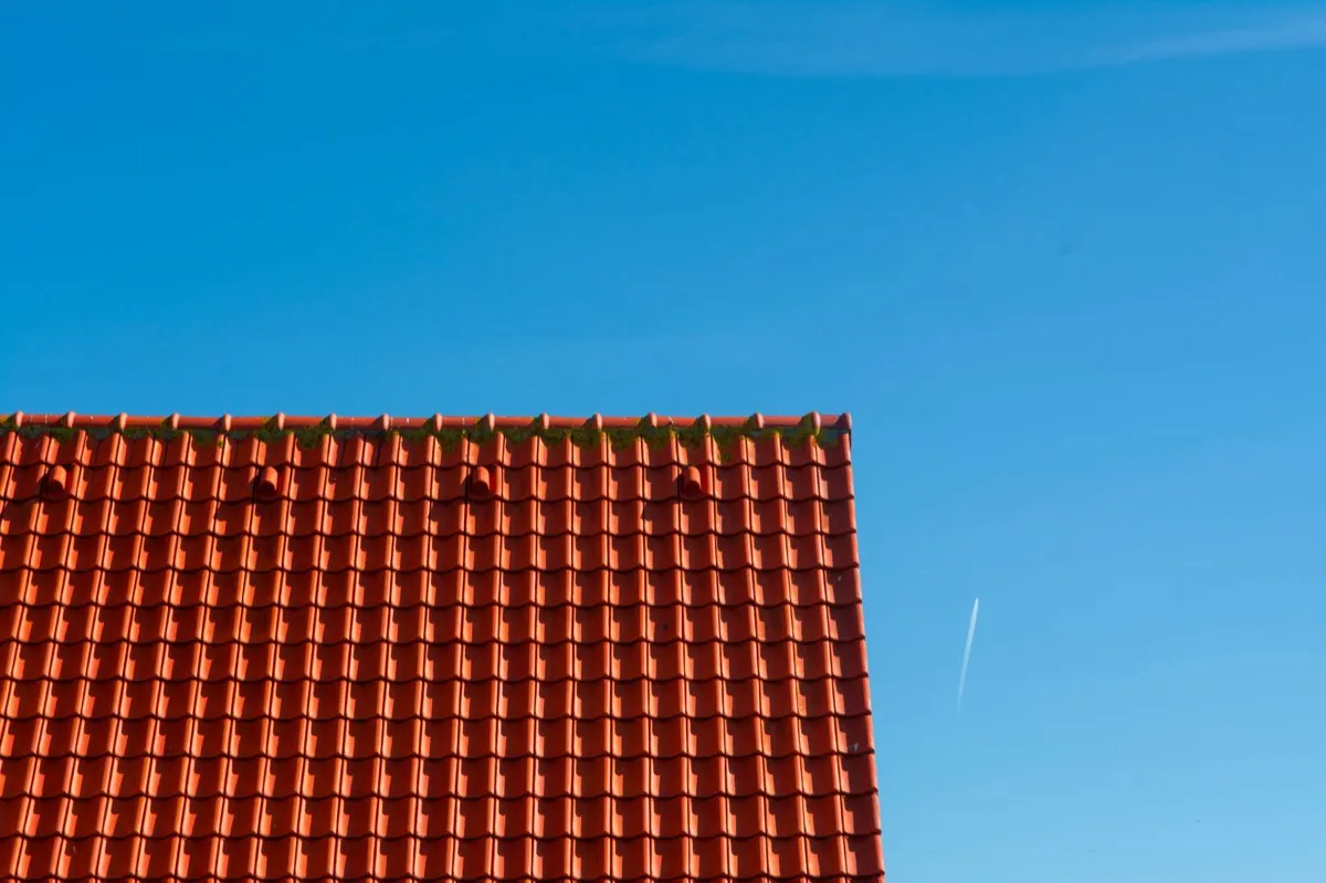 Tile roof gable in full sun, the kind of exposure that sets roof life in Louisville, KY